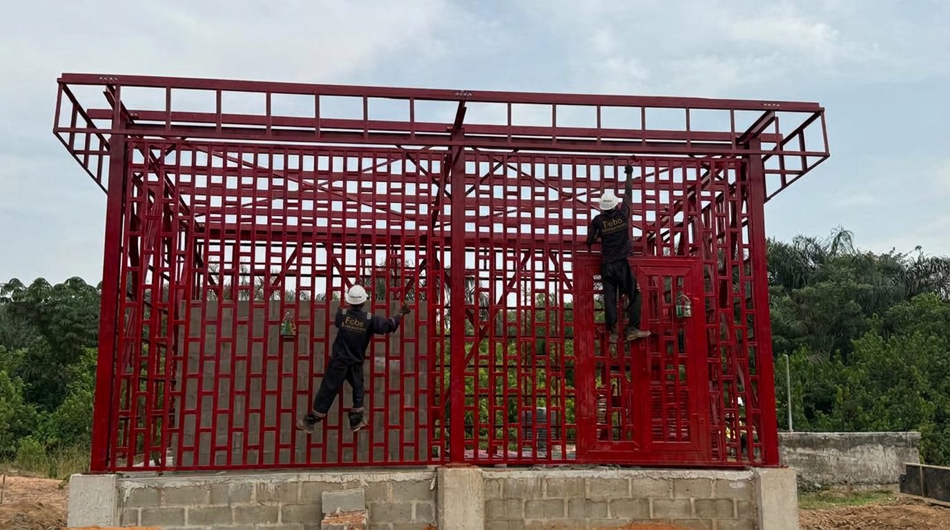 FAB's Associate crew in hard hats finishing a steel-framed structure